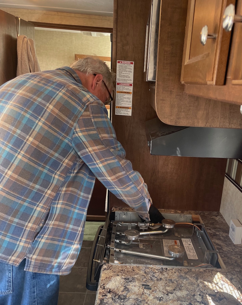 Disassembling RV's Stove
